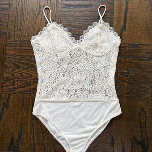 Elegant White Lace Bodysuit